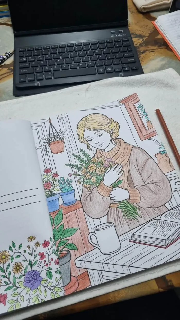 Página do livro colorida à mão, cena de leitura no sofá